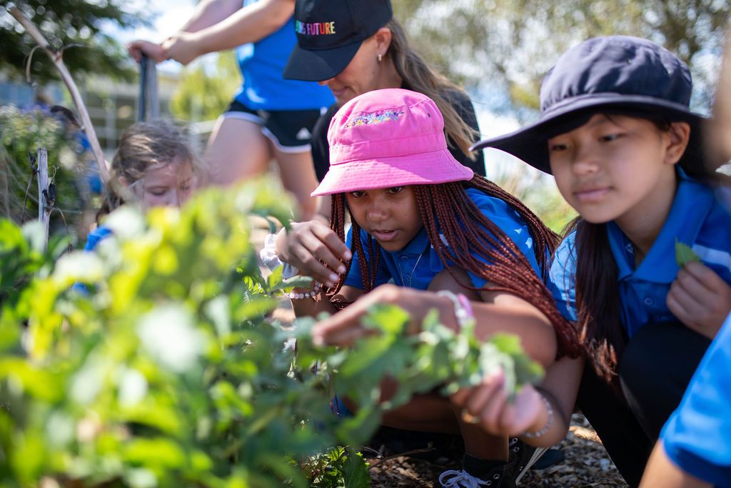 girls in the vegetable garden